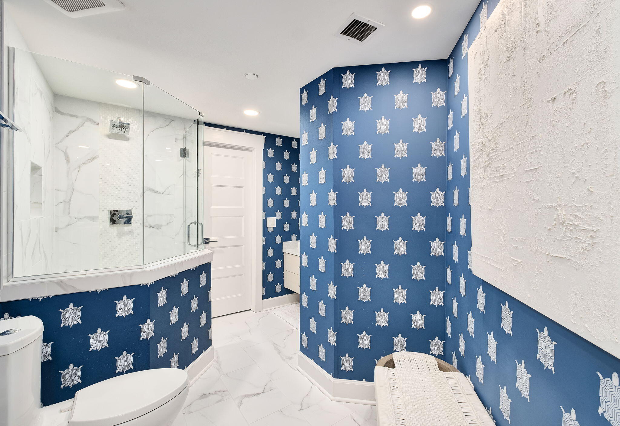 320 Harbor Boulevard, Unit A305 Destin, FL 32541 - Photo 35 of 71 a bathroom with a sink a toilet and shower curtain