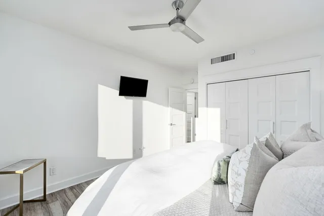 a view of a balcony with furniture and city view