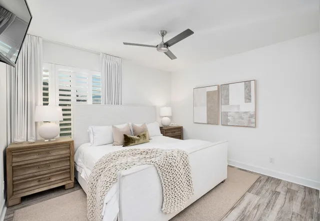 a kitchen with a table and chairs