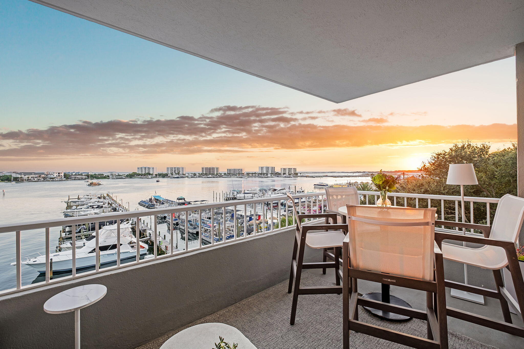 320 Harbor Boulevard, Unit A305 Destin, FL 32541 - Photo 41 of 71 a view of a balcony with furniture and city view