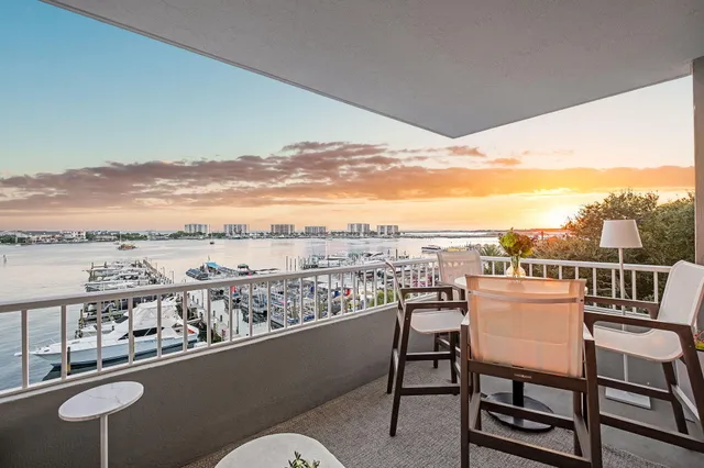 a view of a patio with wooden floor