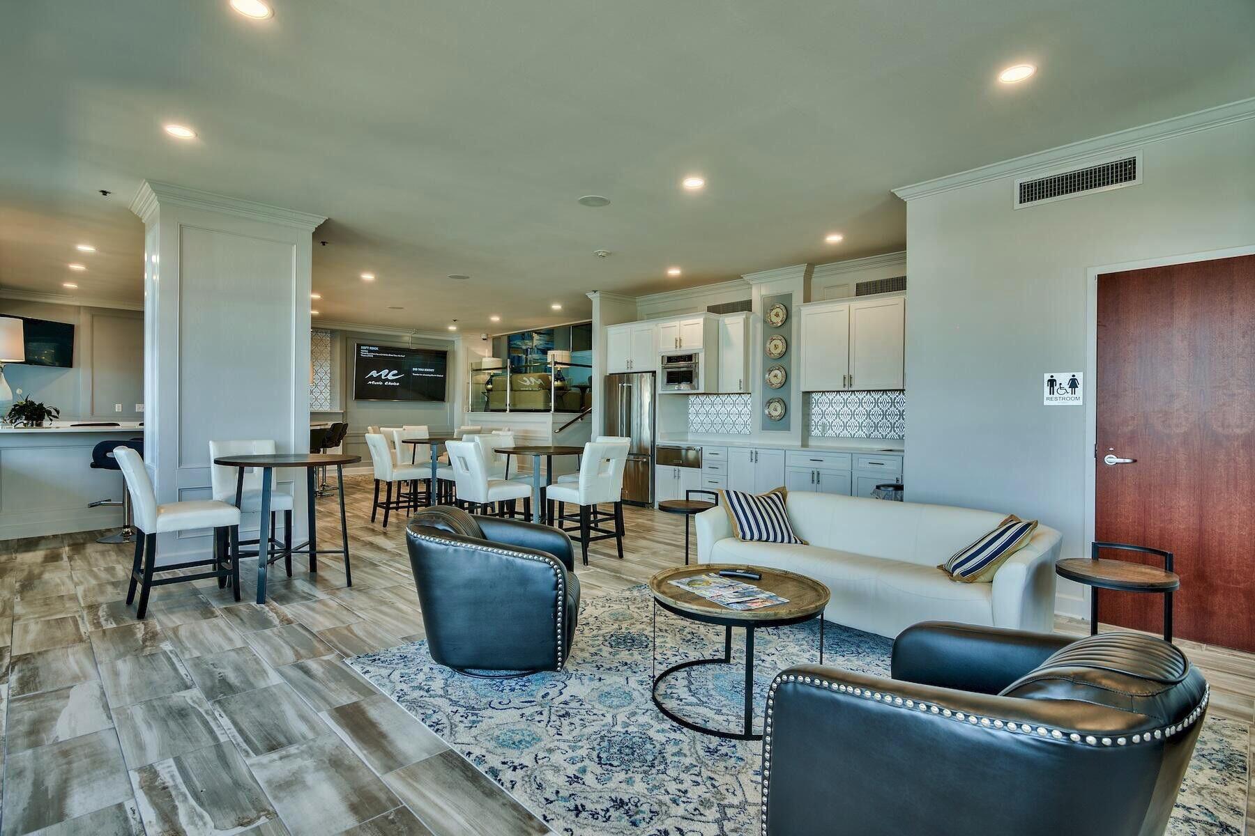 320 Harbor Boulevard, Unit A305 Destin, FL 32541 - Photo 50 of 71 a living room with furniture and a view of kitchen