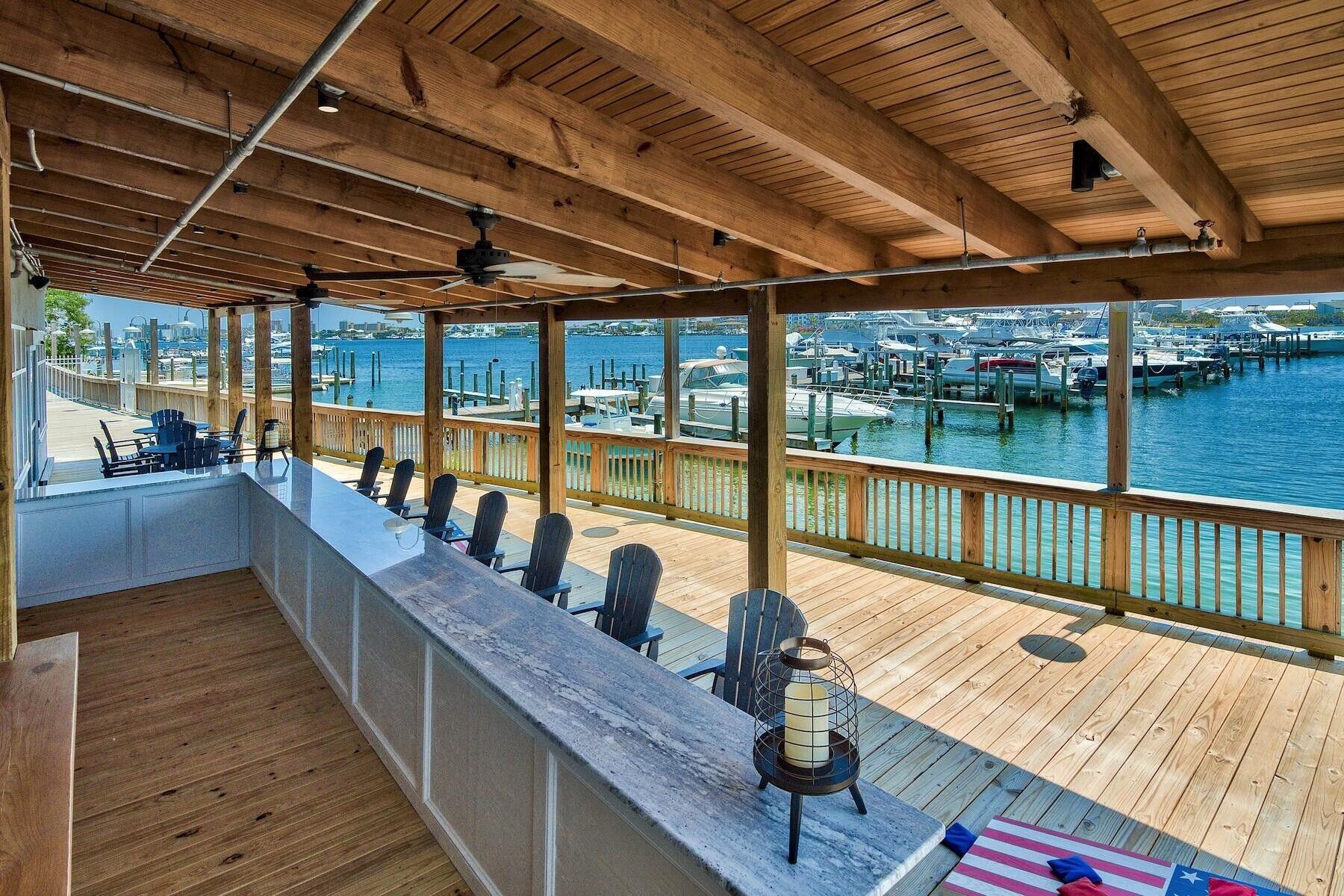 320 Harbor Boulevard, Unit A305 Destin, FL 32541 - Photo 51 of 71 a view of a balcony with wooden floor