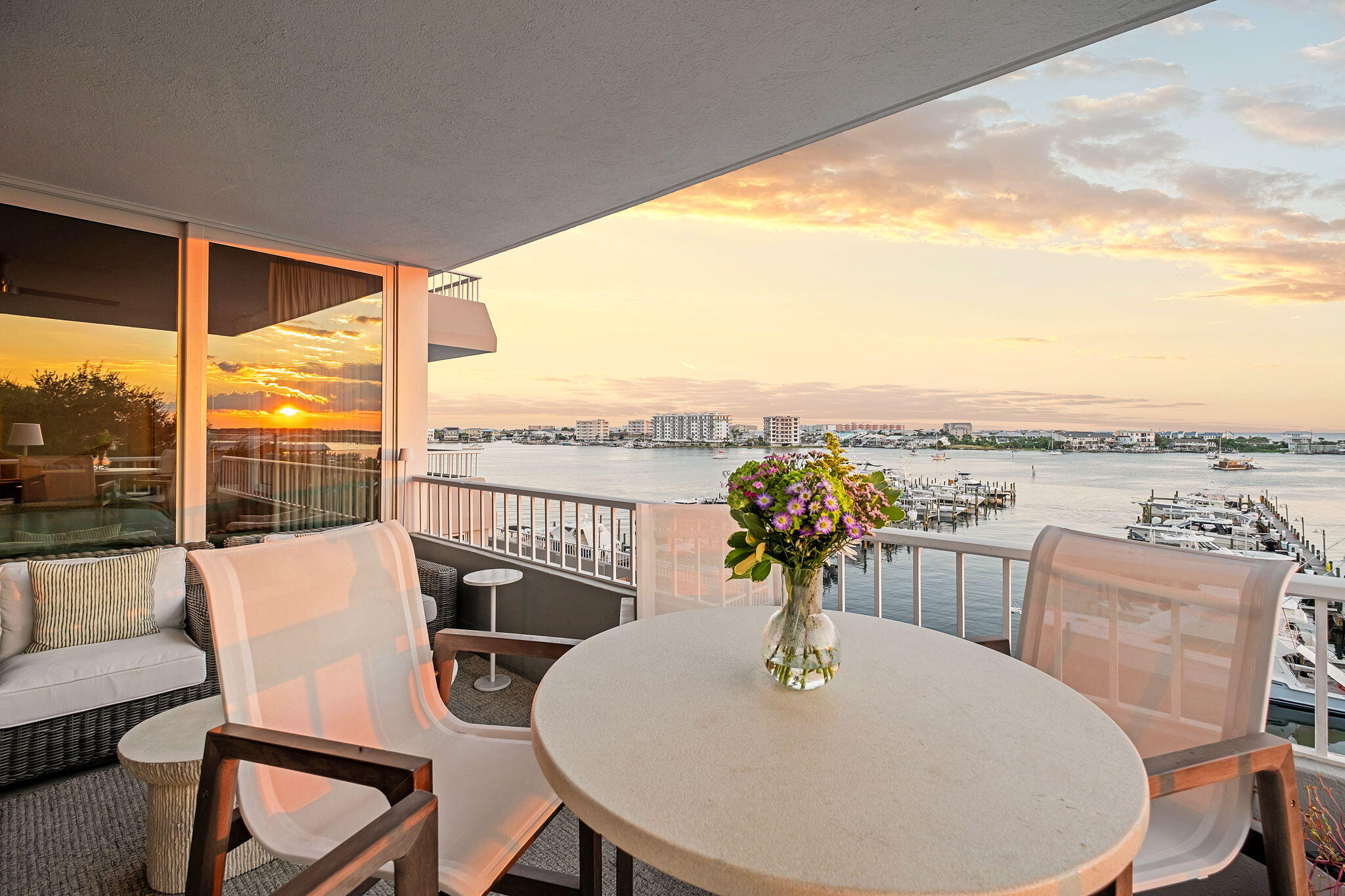 320 Harbor Boulevard, Unit A305 Destin, FL 32541 - Photo 7 of 71 a view of a dining room with furniture window and wooden floor