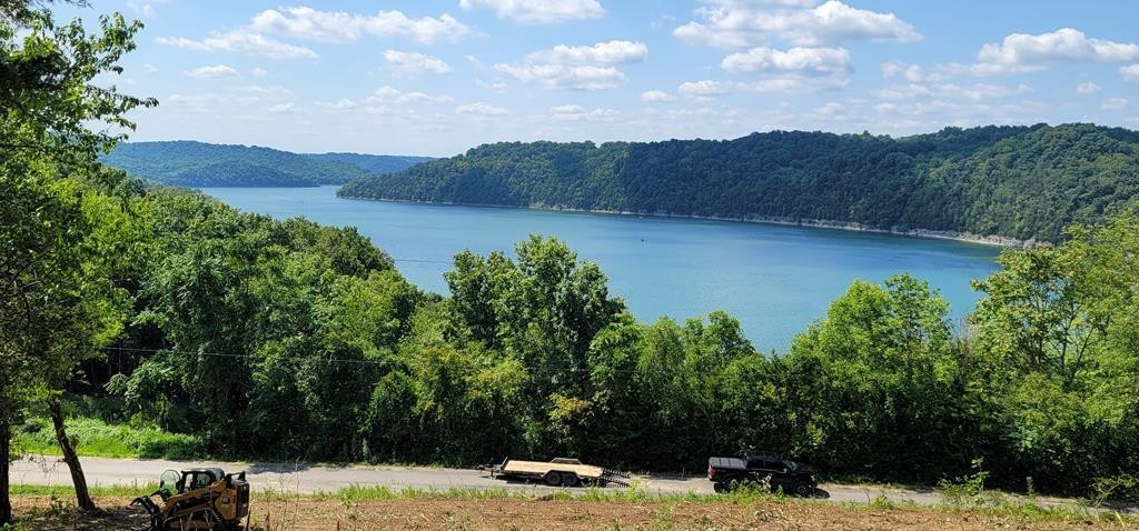 84 Harbor Pointe Drive Silver Point, TN 38582 - Photo 1 of 7 a view of a lake with mountains in the background