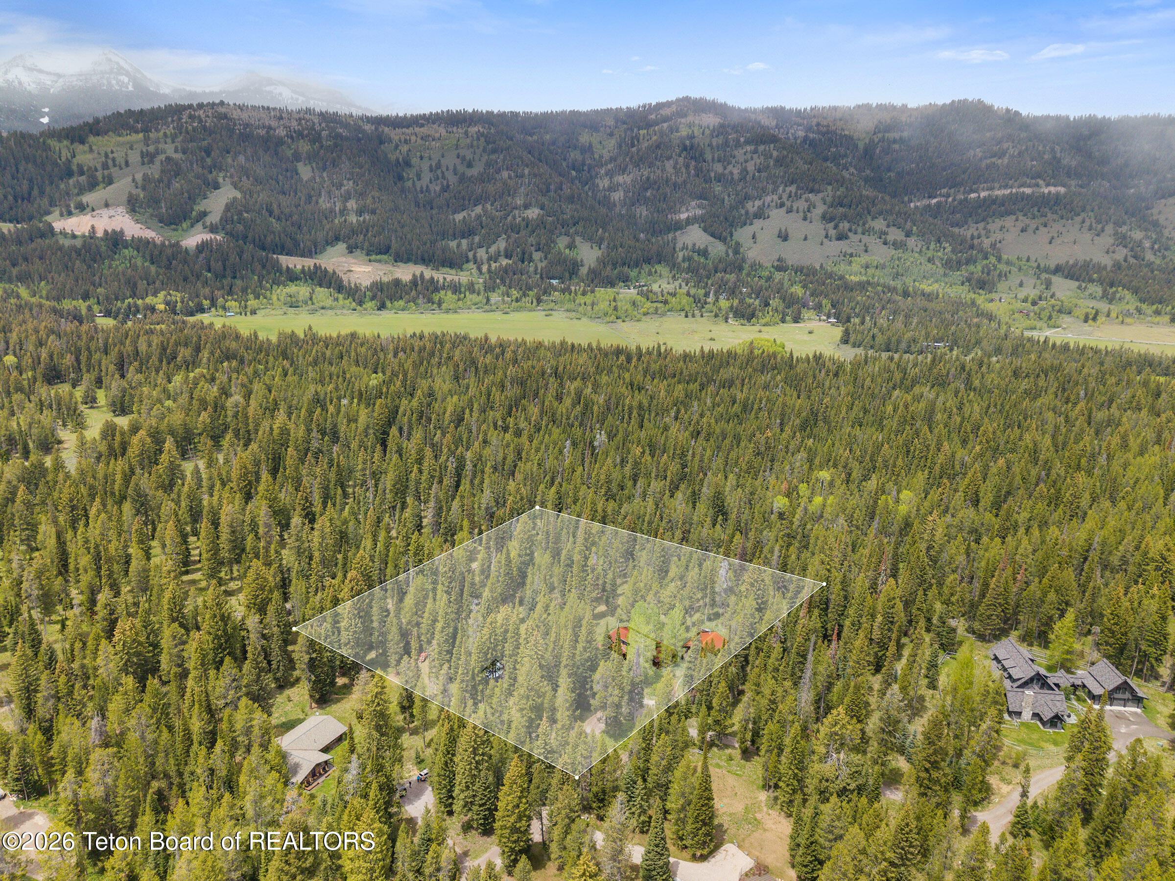 6475 Heck Of A Hill Road Wilson, WY 83014 - Photo 6 of 36 6 Drone View West Lines_Email