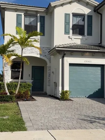 a house view with a outdoor space