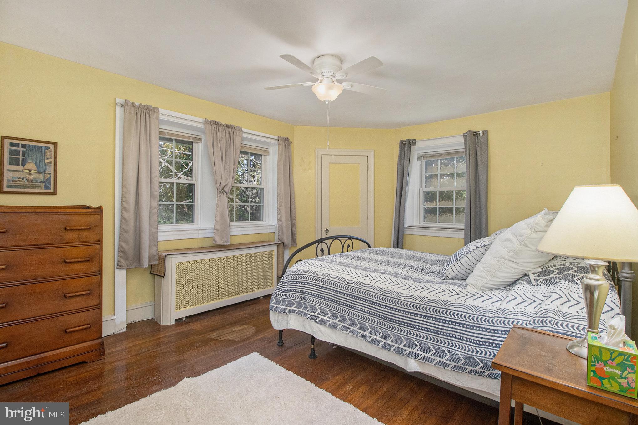 7115 Llanfair Road Upper Darby, PA 19082 - Photo 22 of 49 Third bedroom with hardwood floors & ceiling fan.