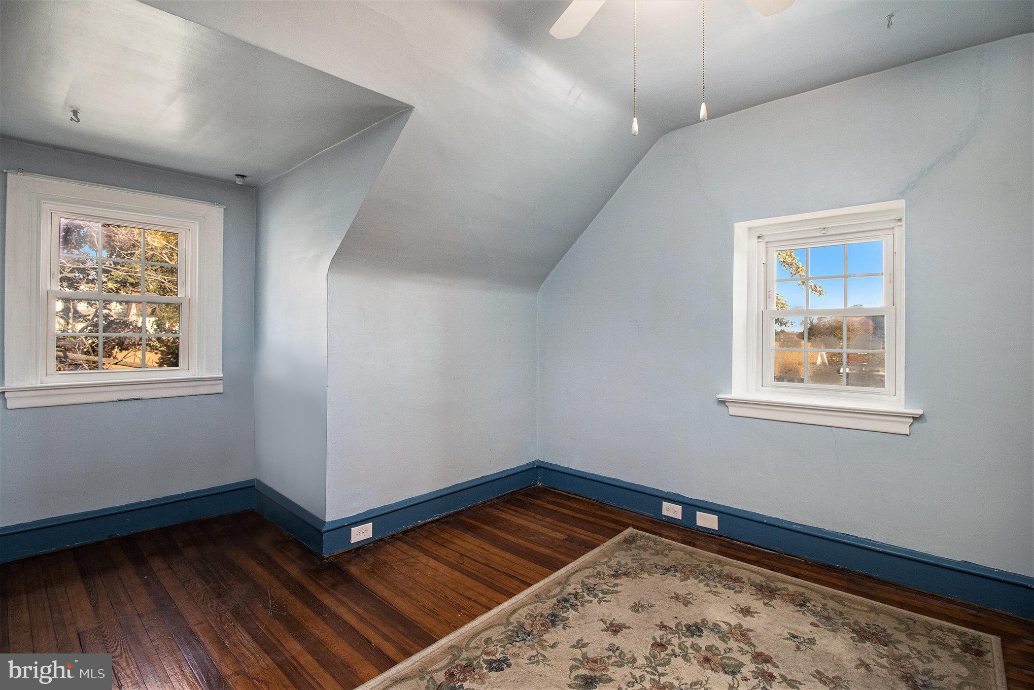 7115 Llanfair Road Upper Darby, PA 19082 - Photo 30 of 49 Fifth bedroom with hardwood floors & ceiling fan.