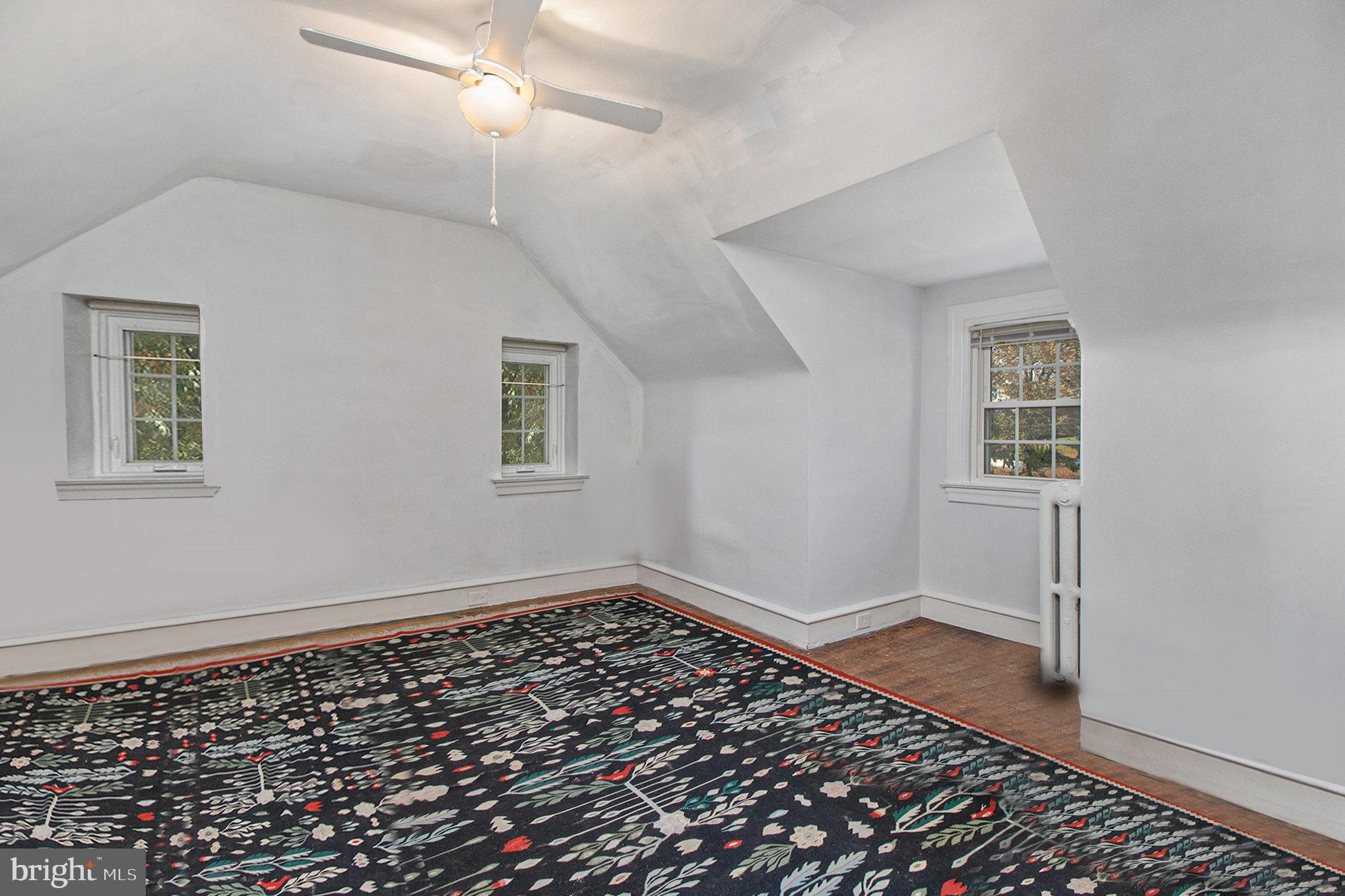 7115 Llanfair Road Upper Darby, PA 19082 - Photo 31 of 49 Sixth bedroom with hardwood floors & ceiling fan.