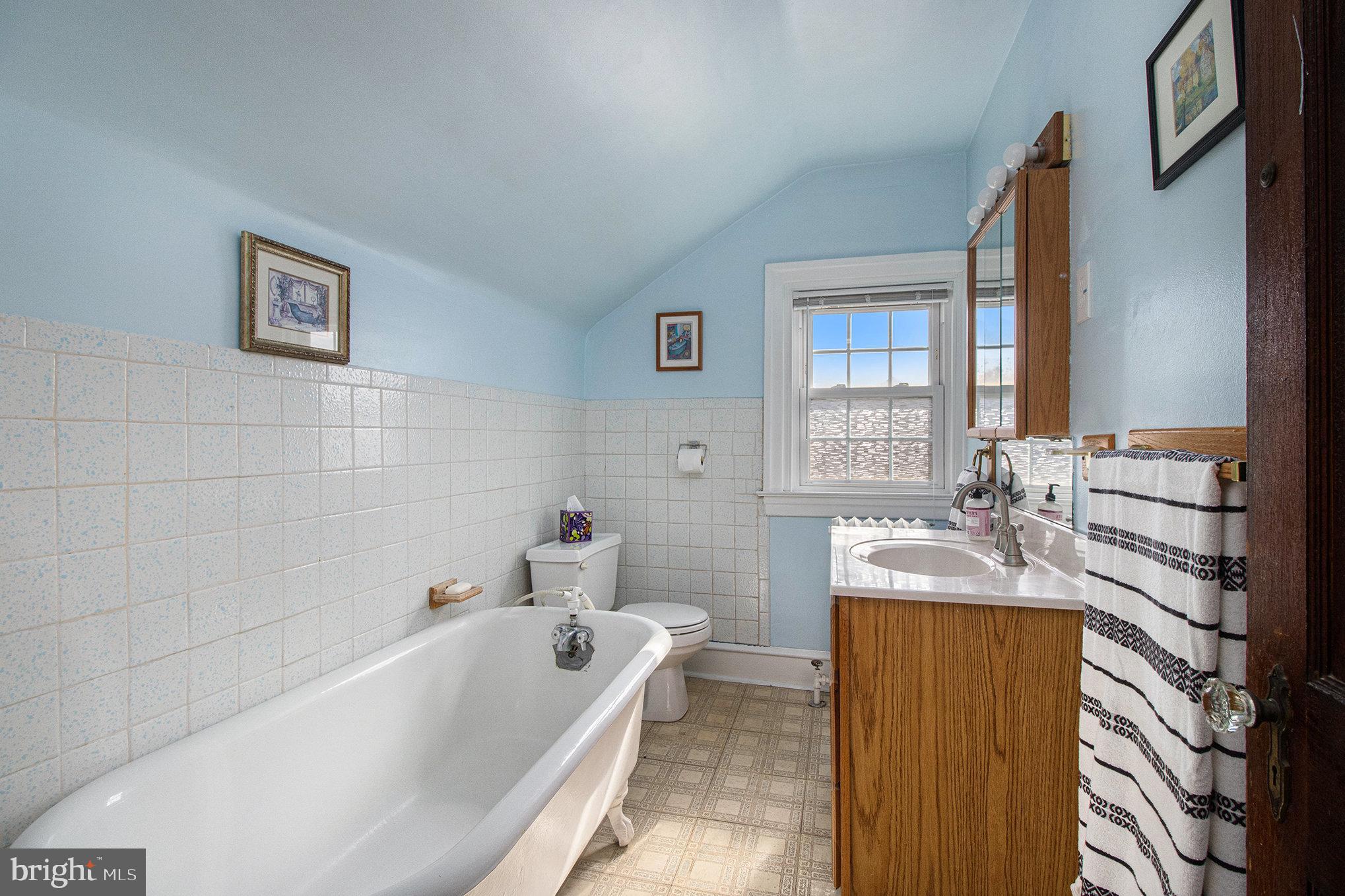 7115 Llanfair Road Upper Darby, PA 19082 - Photo 33 of 49 Third floor bathroom with claw foot tub.