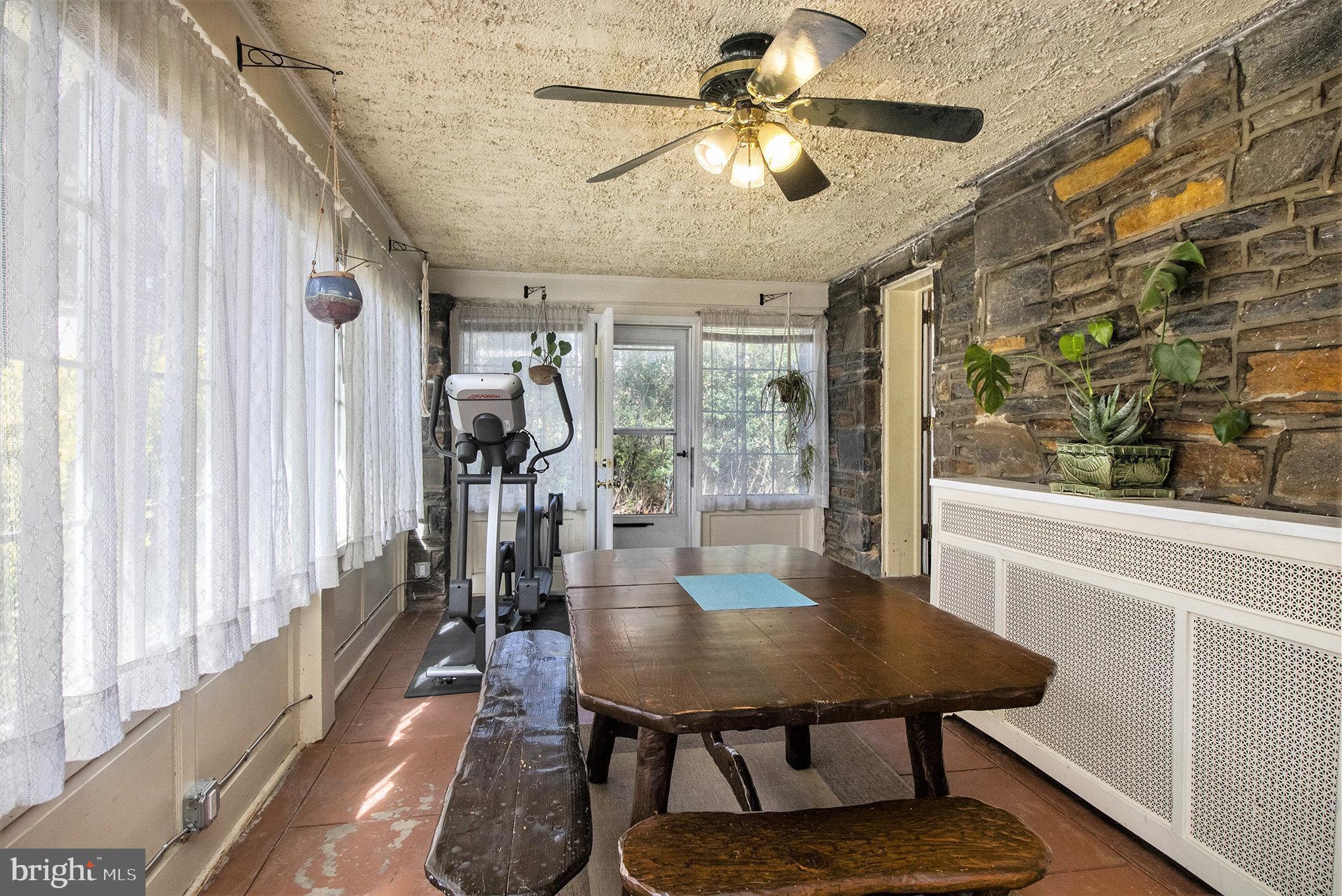 7115 Llanfair Road Upper Darby, PA 19082 - Photo 34 of 49 Warm and inviting enclosed sun porch.