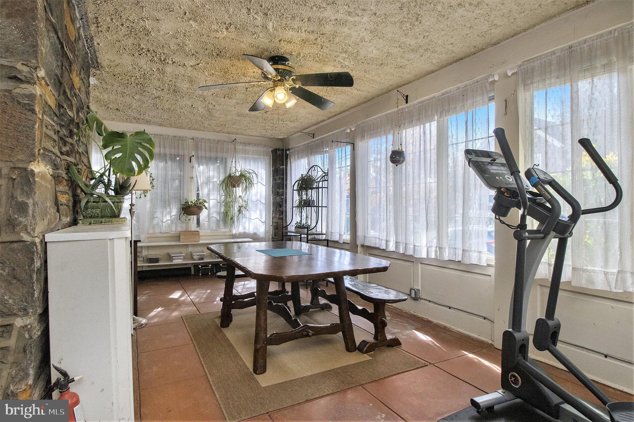 7115 Llanfair Road Upper Darby, PA 19082 - Photo 35 of 49 Heated sunporch with tons of natural light.