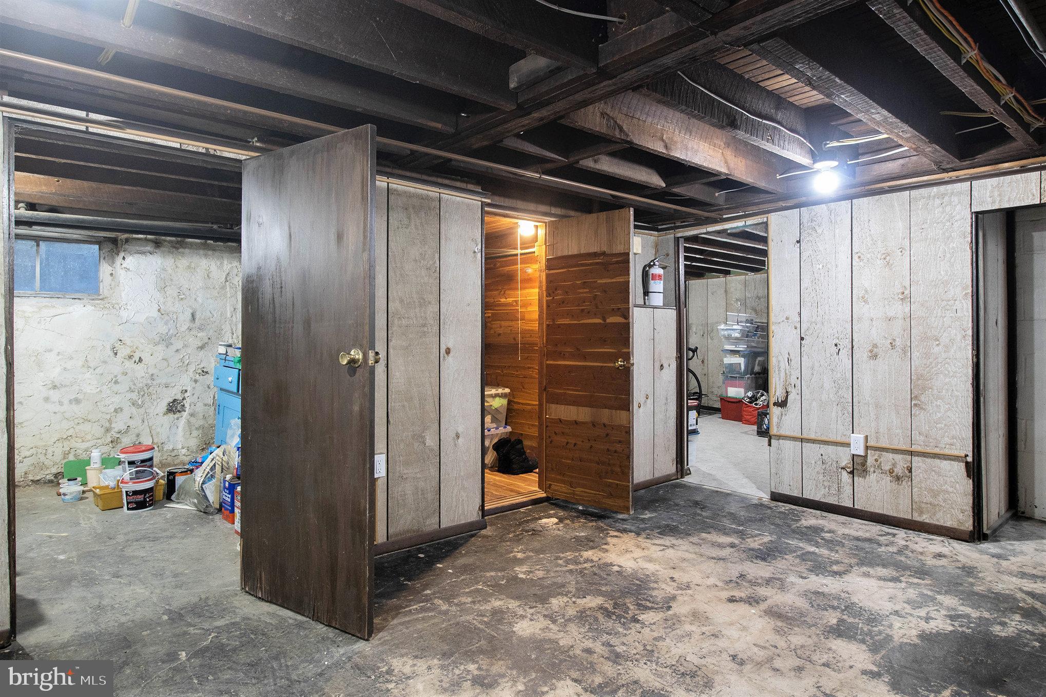 7115 Llanfair Road Upper Darby, PA 19082 - Photo 36 of 49 Basement with storage spaces.