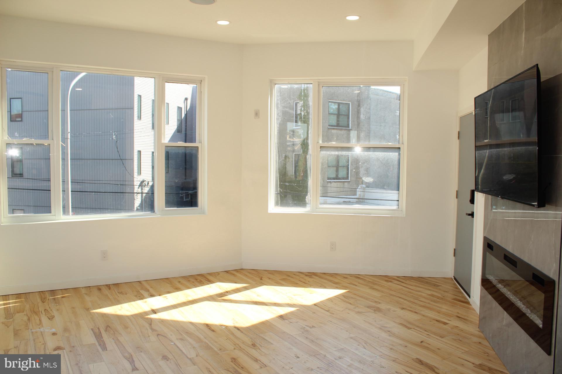 3017 Ridge Avenue, Unit C Philadelphia, PA 19121 - Photo 8 of 27 Bright and airy modern living space.