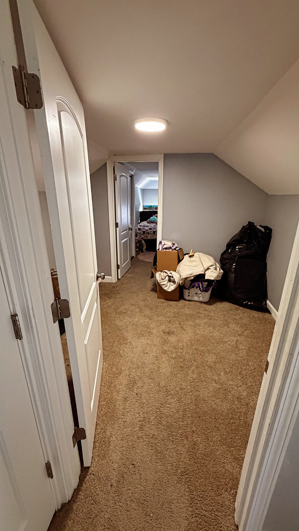 10529 South Perry Avenue Chicago, IL 60628 - Photo 15 of 17 a living room with furniture and a rug