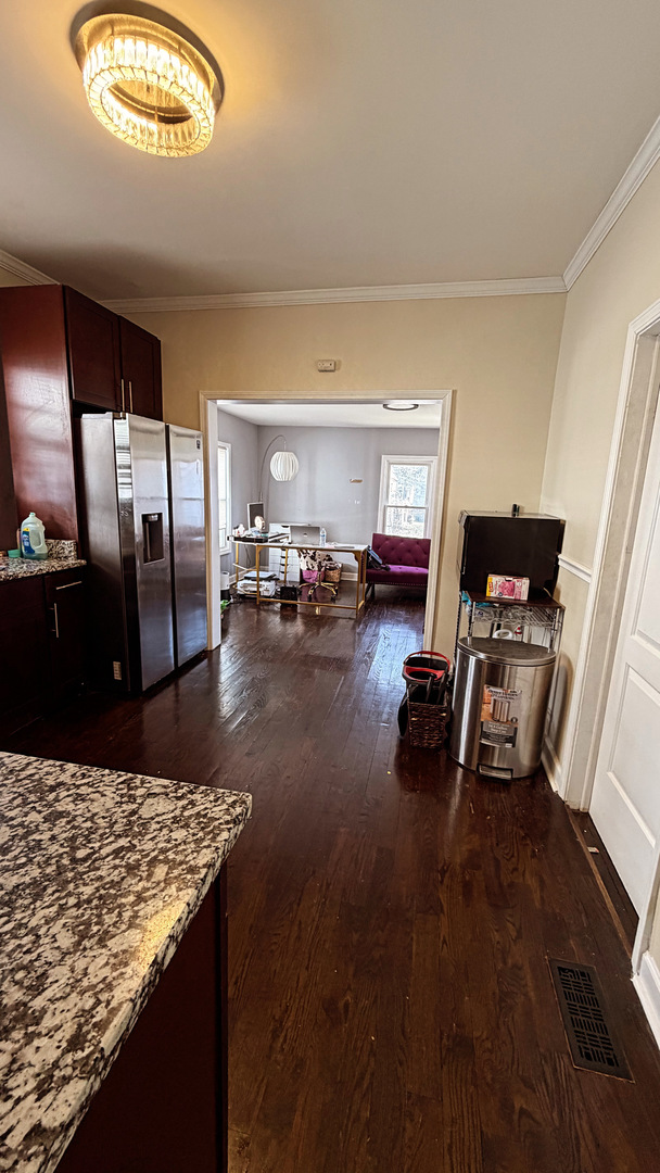 10529 South Perry Avenue Chicago, IL 60628 - Photo 6 of 17 a view of a room with gym equipment