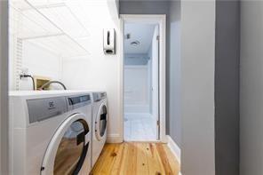 210 Walker Street Southwest, Unit 1 Atlanta, GA 30313 - Photo 27 of 37 a view of storage and utility room with washer and dryer