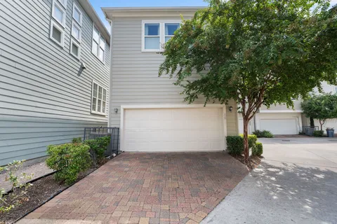 a view of house with garden