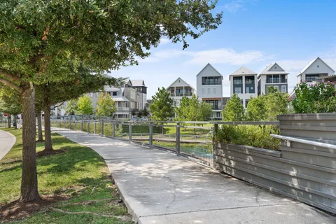 a view of a lake with a house in the background