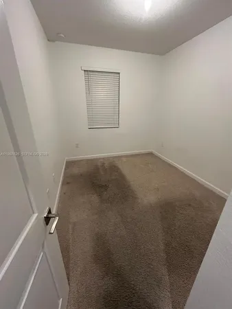 a view of a room with an empty space
