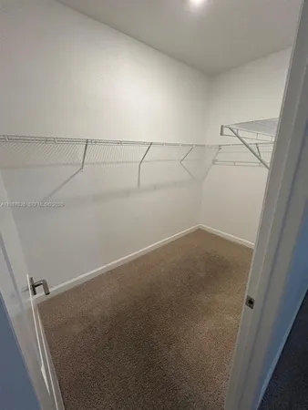 a utility room with washer and dryer