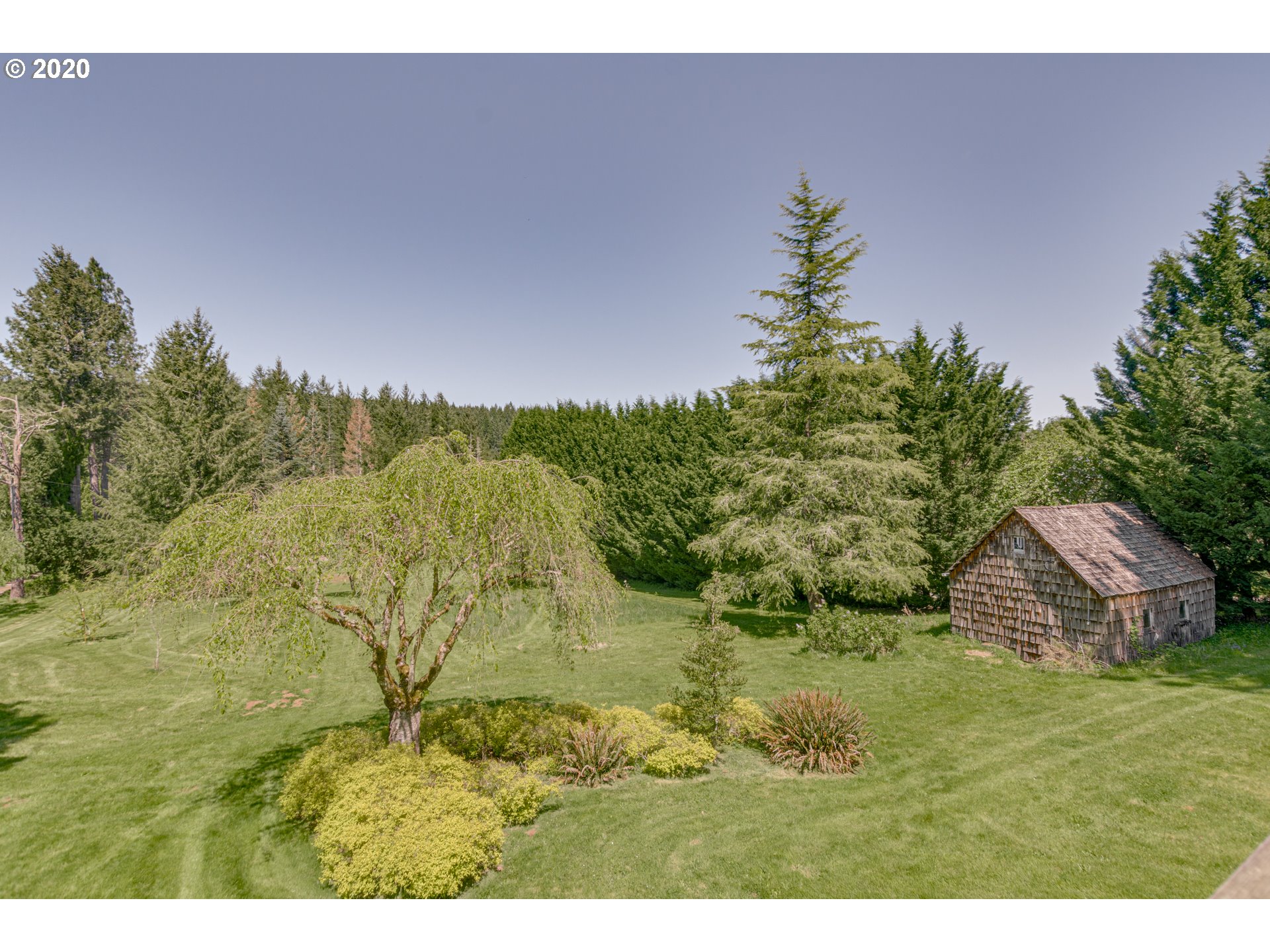 23506 South Bonney Road Colton, OR 97017 - Photo 4 of 32 a view of an outdoor space and a yard