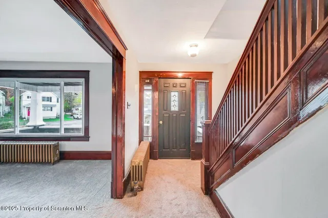 a view of a hallway with elevator