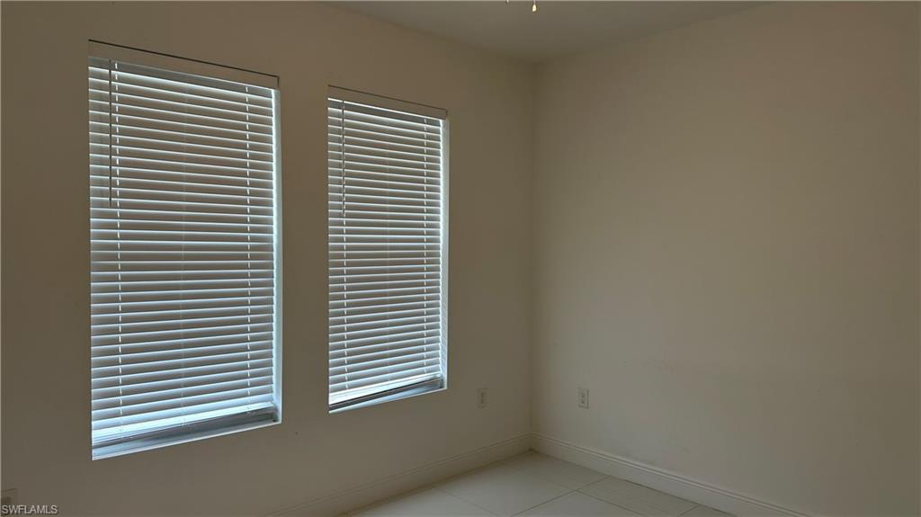 5901 Rita Avenue North Lehigh Acres, FL 33971 - Photo 19 of 22 a view of a room that has a window in it