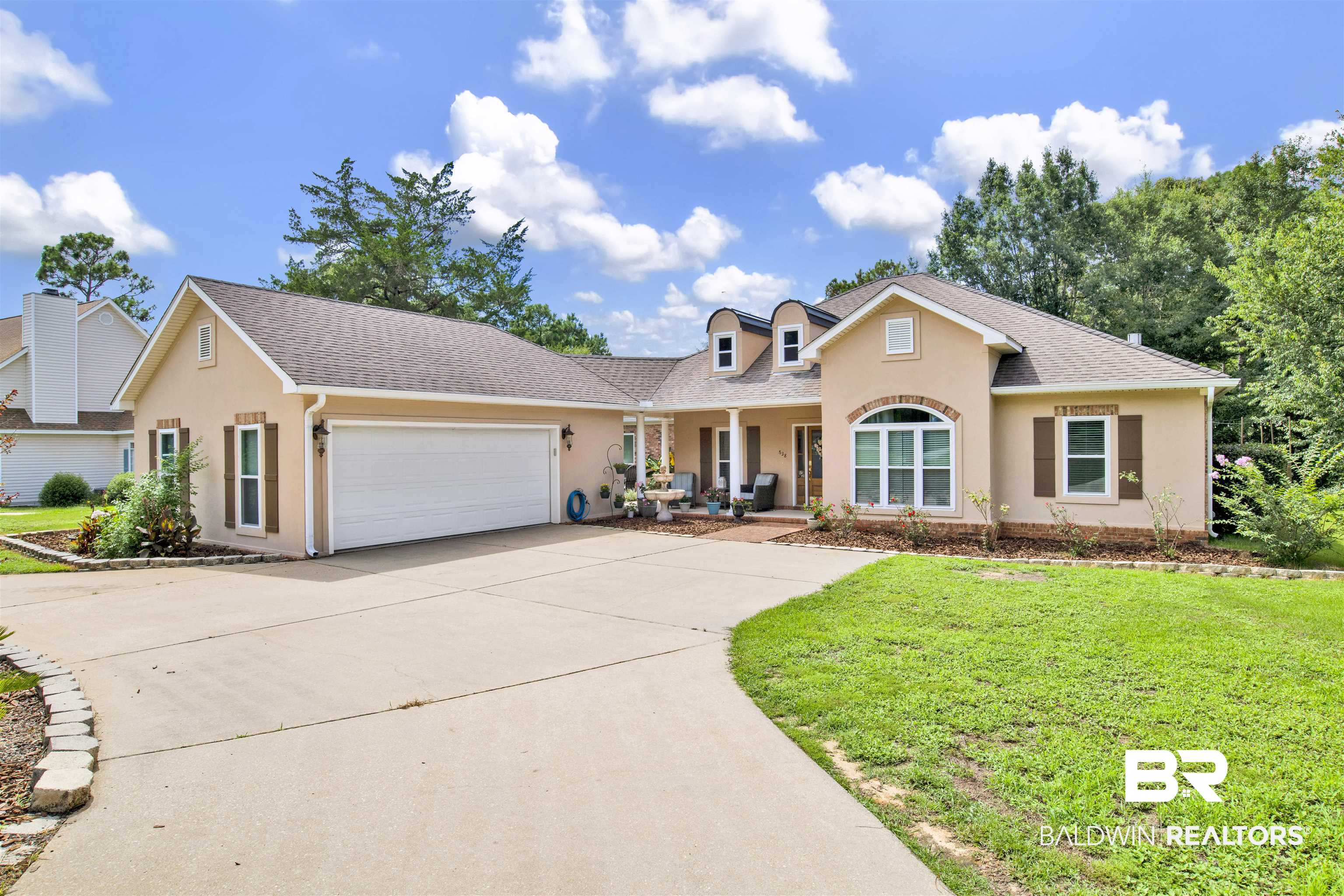 638 Southern Way Daphne, AL 36527 - Photo 25 of 26 View of front facade with a garage and a front yard
