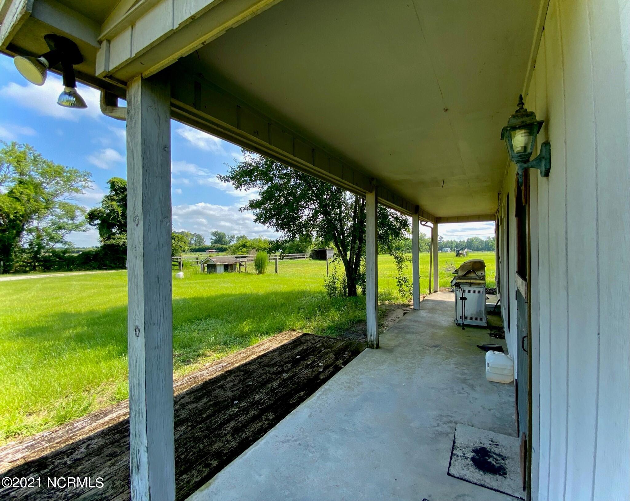 970 Moore Town Road Rocky Point, NC 28457 - Photo 13 of 32 main house porch