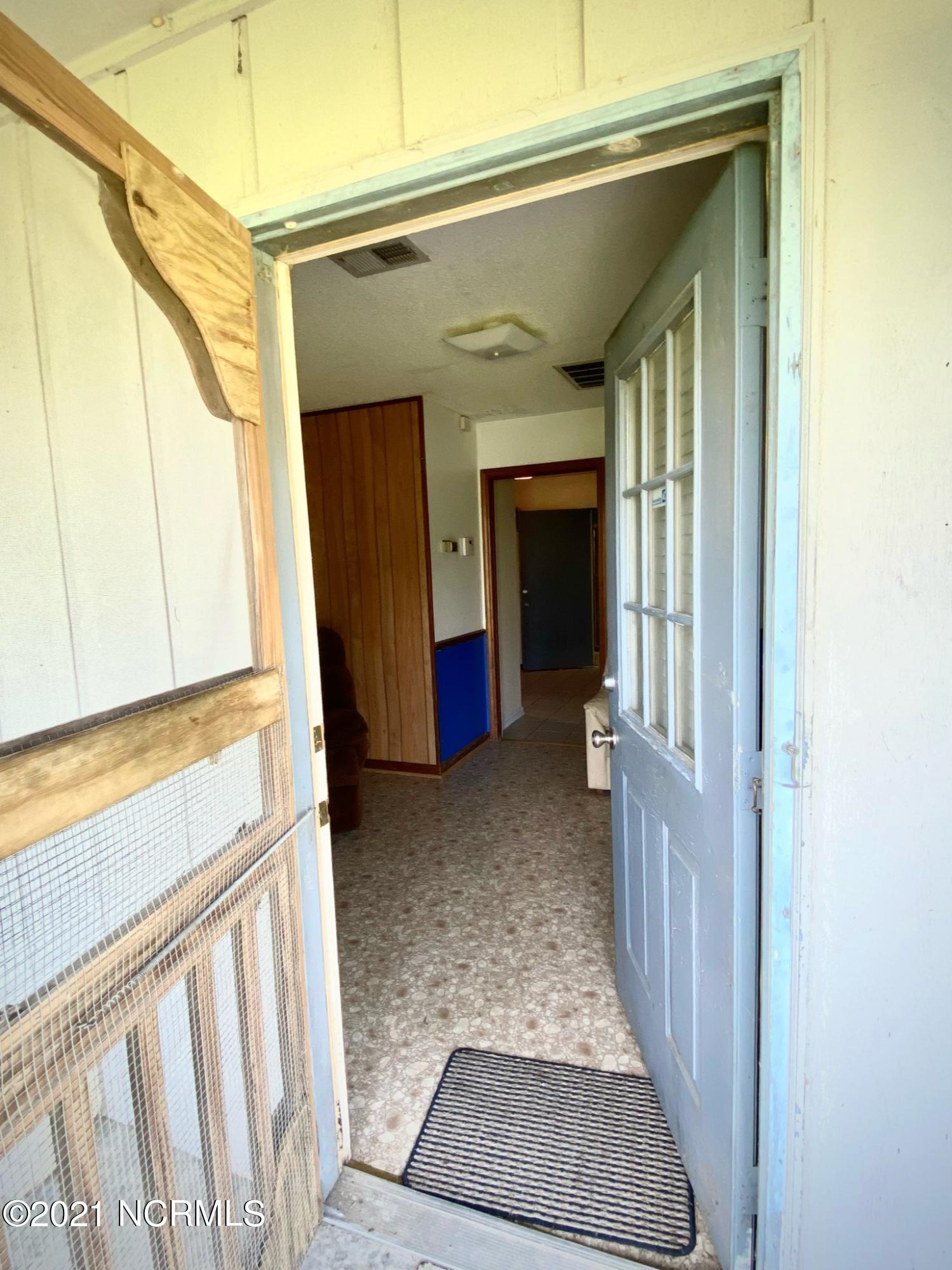 970 Moore Town Road Rocky Point, NC 28457 - Photo 5 of 32 door to main house