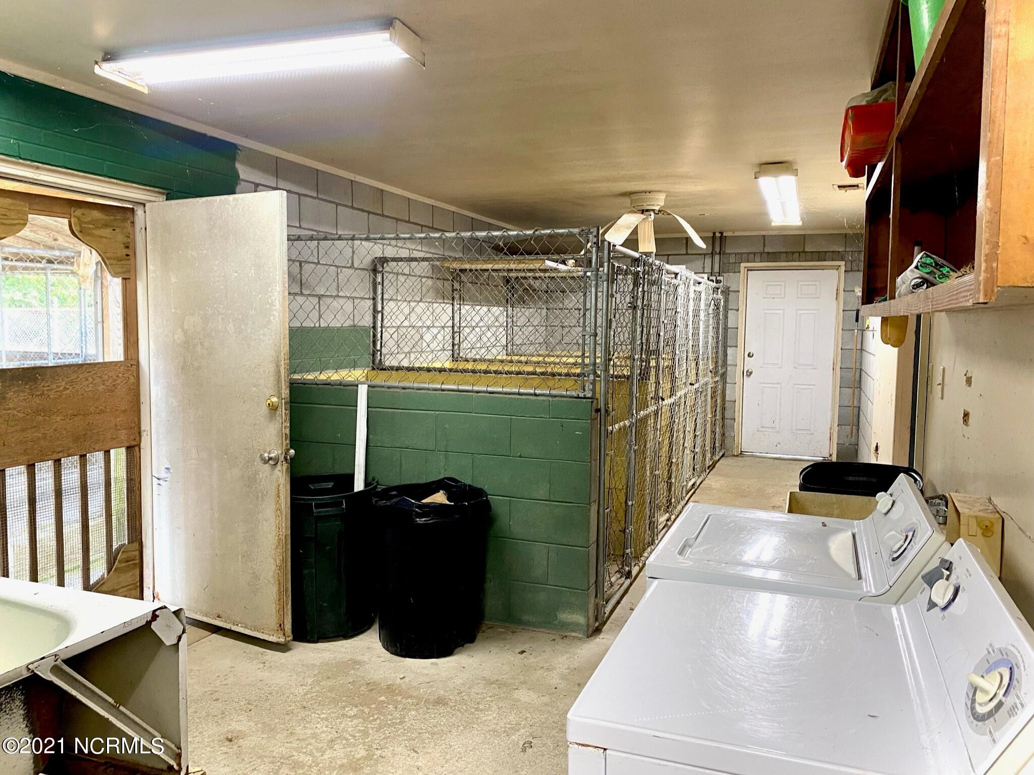 970 Moore Town Road Rocky Point, NC 28457 - Photo 10 of 32 kennels inside