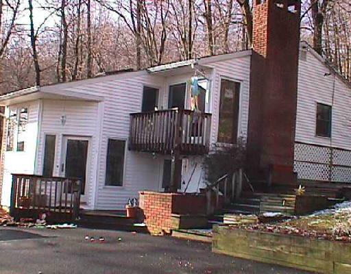 5 Rock Road Ridgefield, CT 06877 - Photo 1 of 1 a view of a house with a street