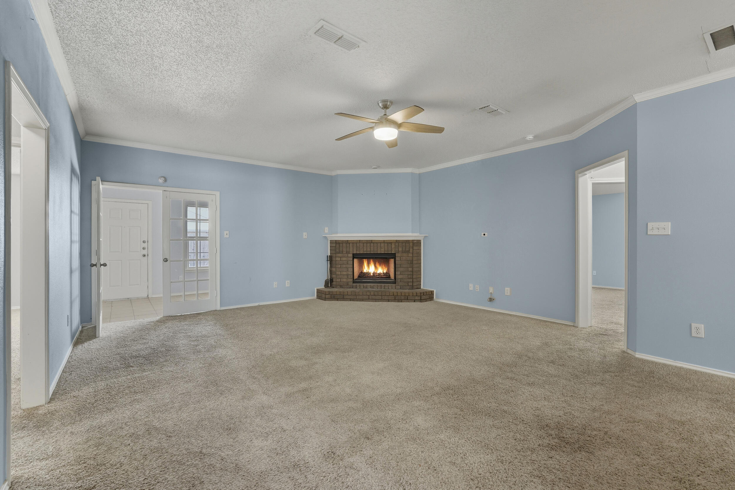 5801 94th Street Lubbock, TX 79424 - Photo 7 of 33 9__mg_8695_livingroomfireplace_2