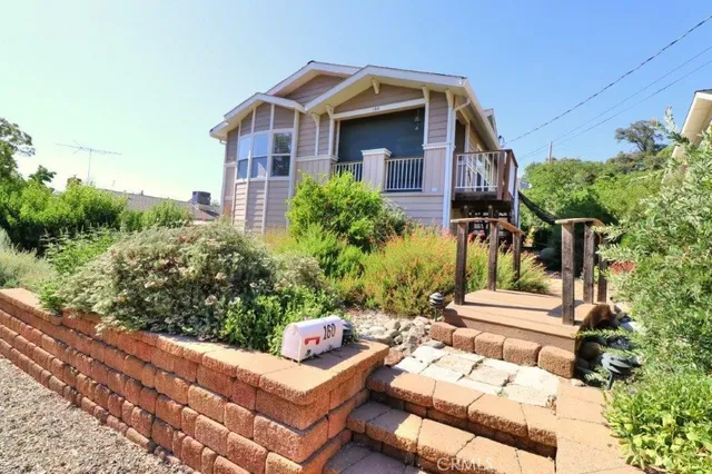 a view of a backyard with sitting area