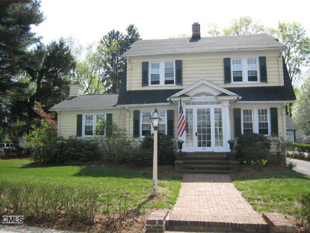54 Turney Road Fairfield, CT 06824 - Photo 1 of 1 a front view of a house with garden