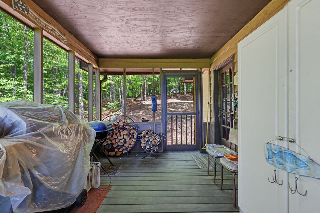 3235 Hiwassee Dam Access Road Murphy, NC 28906 - Photo 39 of 45 a living room with furniture and wooden floor