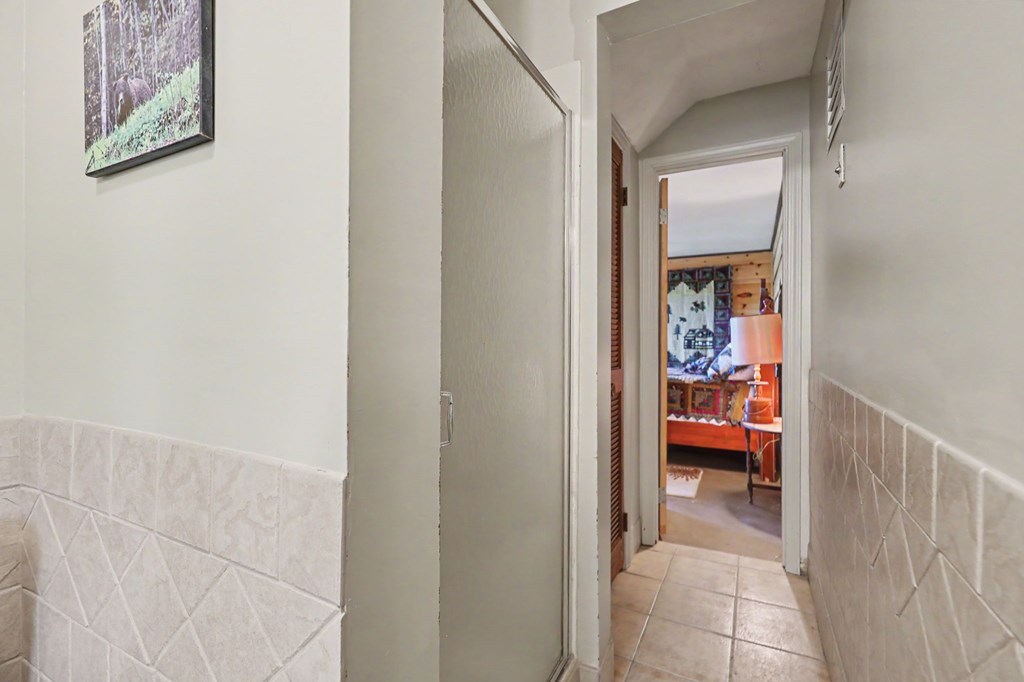 3235 Hiwassee Dam Access Road Murphy, NC 28906 - Photo 6 of 45 a view of a hallway to couch and filled with a hallway