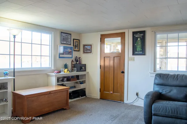 a view of livingroom with furniture and stairs