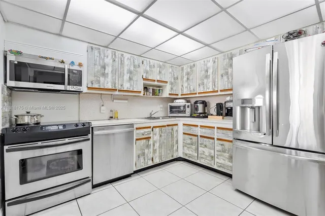 $209,000 | 13499 Biscayne Boulevard, Unit 406, North Miami, FL 33181