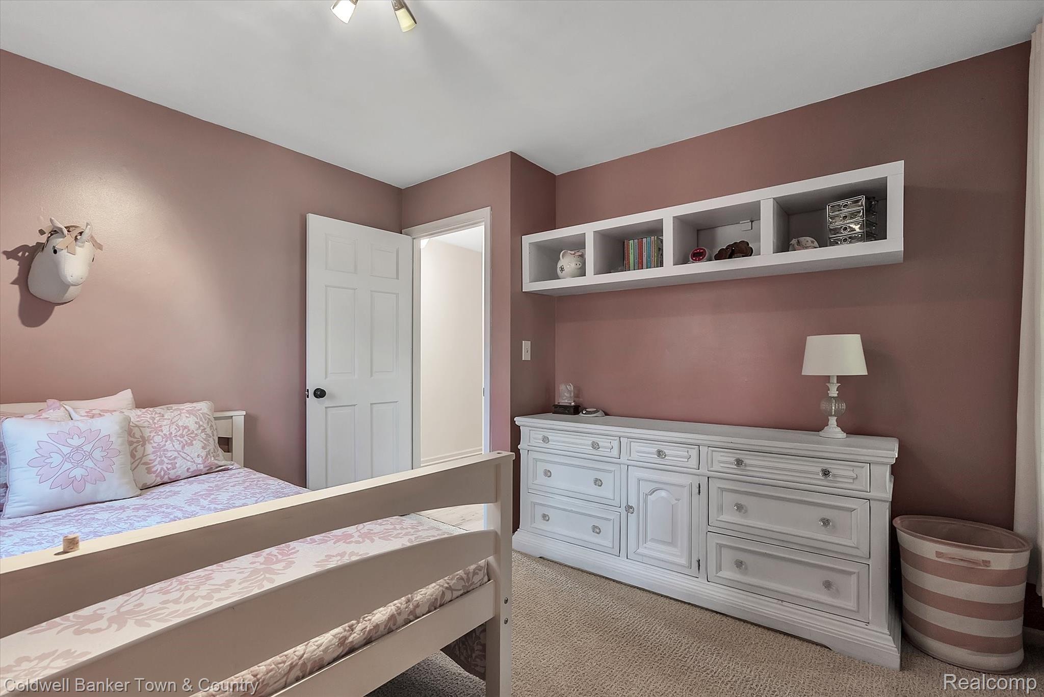 5431 Evans Road Holly, MI 48442 - Photo 33 of 81 Bedroom with brand new carpet (2021) plus built in storage shelf
