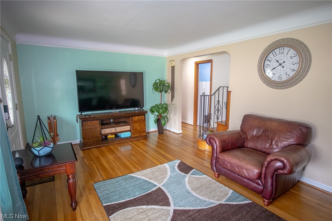 8202 Snow Road Parma, OH 44129 - Photo 5 of 29 Living room with light hardwood floors
