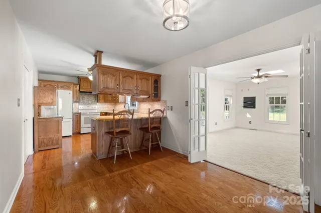 a kitchen with sink cabinets and window
