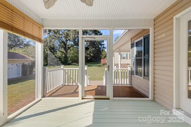 a view of a porch with a garden