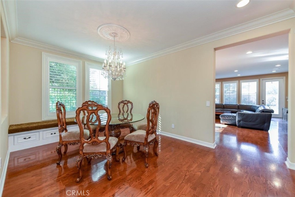 3 Plumbago Irvine, CA 92620 - Photo 14 of 51 a view of a dining room with furniture and wooden floor