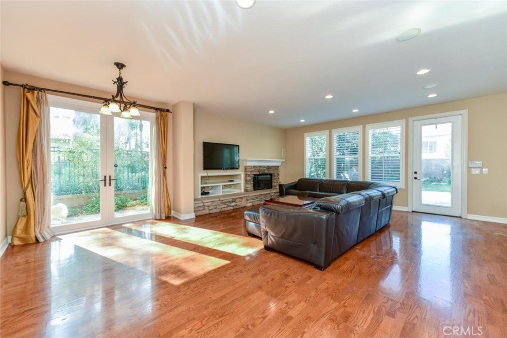 3 Plumbago Irvine, CA 92620 - Photo 28 of 51 a living room with furniture window and flat screen tv