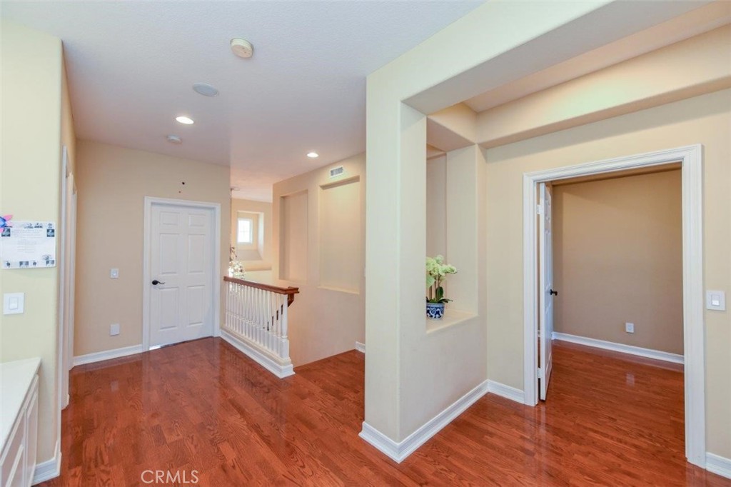 3 Plumbago Irvine, CA 92620 - Photo 40 of 51 a view of an empty room and wooden floor