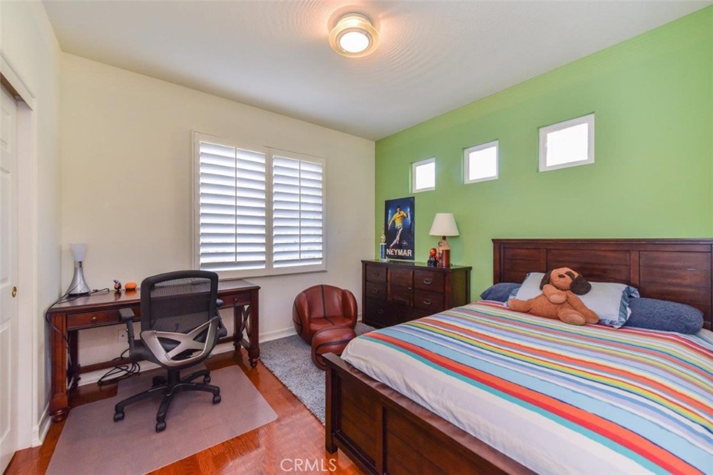 3 Plumbago Irvine, CA 92620 - Photo 41 of 51 a bedroom with a bed and a desk