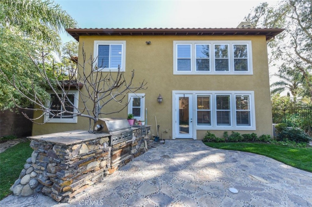 3 Plumbago Irvine, CA 92620 - Photo 50 of 51 a front view of a house with garden